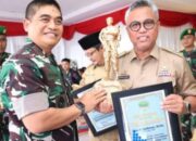 Bupati Budiman Terima Penghargaan dari Danrem 141/Toddopuli